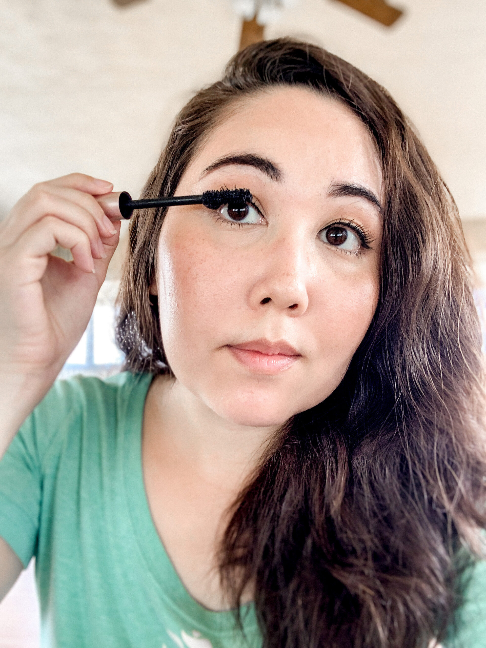 applying mascara natural makeup