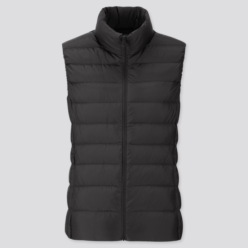 How To Layer Winter Travel black puffer vest
